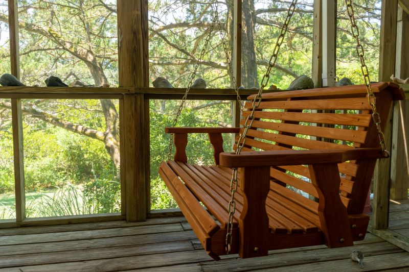 How A Freestanding Porch Installation Enhances Backyard Functionality