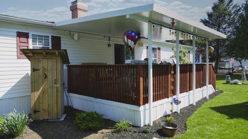How A Freestanding Porch Installation Enhances Backyard Functionality